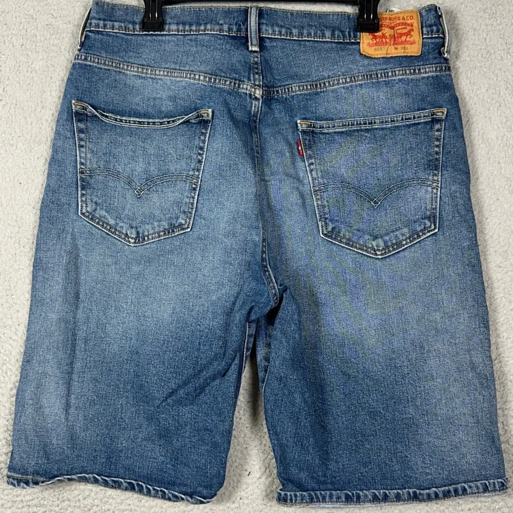 Levis 569 Shorts Mens 36 Blue Loose Straight Denim Distressed Stretch 5-Pocket